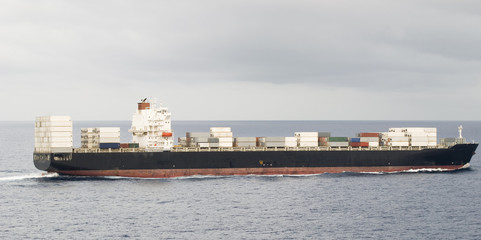 Large container cargo ship in the open sea