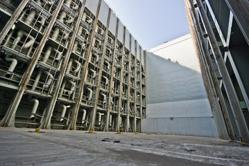 empty ship's cargo holds during container discharge in port © donvictori0
