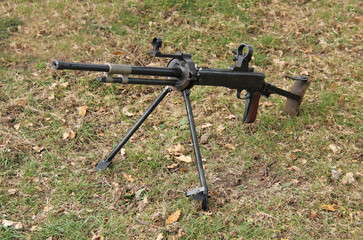 A Vintage Military Army Machine Gun on a Support Stand.