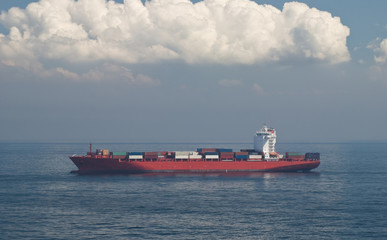 Large container vessel ship and the horizon