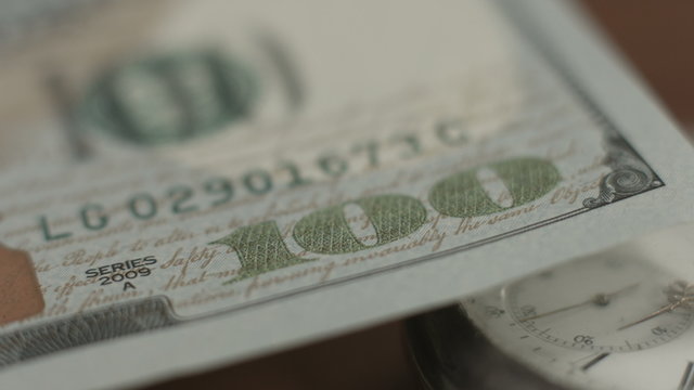 New 100 dollar bill U.S. paper money closeup, counterfeit note