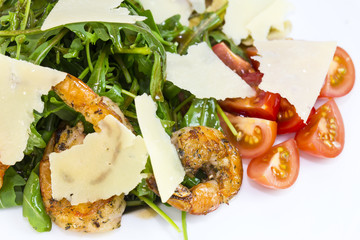 shrimp salad and greens on a white background