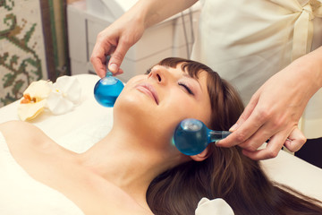 Naklejka premium massage and facial peels at the salon cosmetics