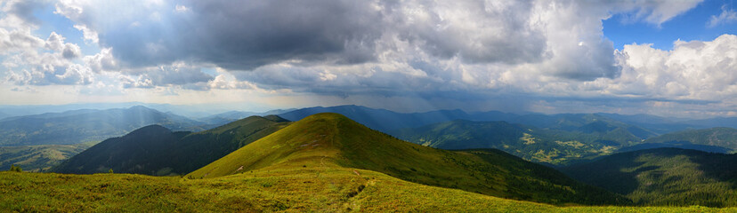 Panoramic sunrays mountains