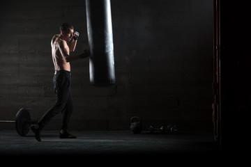 young boxer in light weight with bare-chested