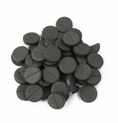 stack of activated carbon on white background
