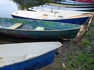 Boats at the berth on the shore of the lake