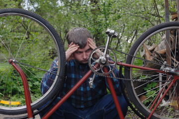 man has problem with bicycle