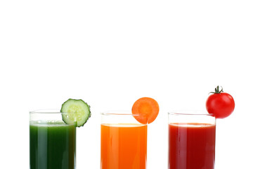 Fresh vegetable juices isolated on white