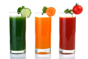 Fresh vegetable juices isolated on white