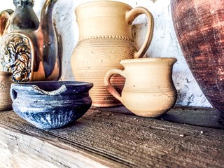 vintage ware on the wooden shelf closeup