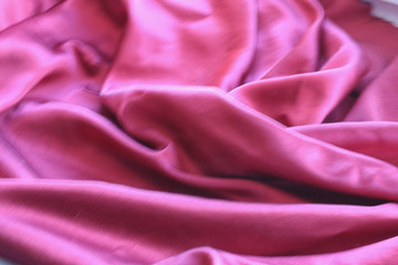 background texture of shiny red silk