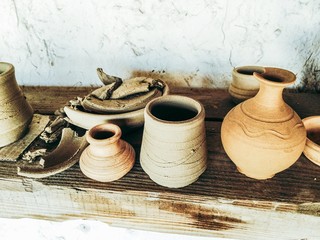 old ware on the wooden shelf