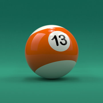 Billiard ball number 13 striped white and orange color on green