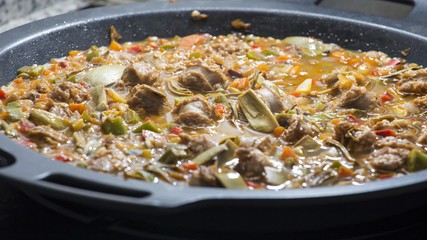 Cooking a typical Spanish paella
