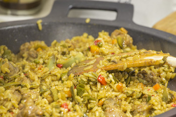 Spanish paella ready to serve close up