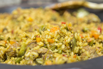 Spanish paella ready to serve close up