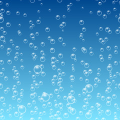 Bubbles in water on blue background