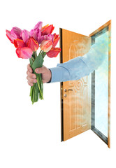 Hand sends a bouquet of tulips in the open door. isolated