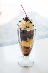 Chocolate sundae in the clear glass cup