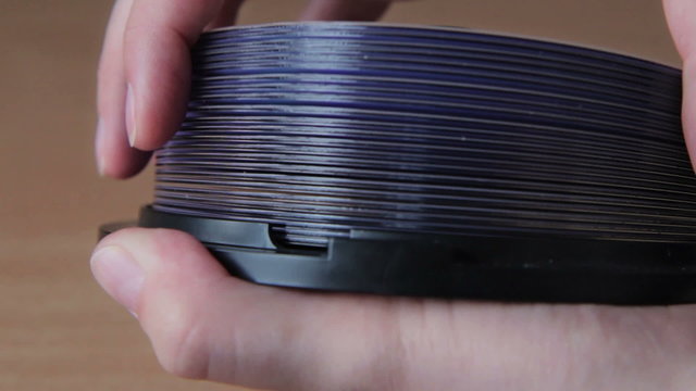 Woman shuffle a DVD