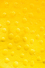 Drops on yellow background