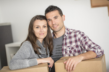 young adults moving in new home