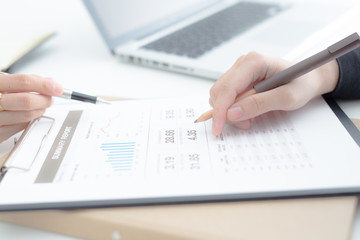 Business people discussing the charts and graphs showing the res