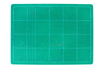 used green cutting mat on white background