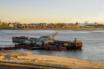 River barge against Kazan on sunset