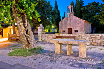 Fototapeta na wymiar Sukosan dalmatian village historic stone church