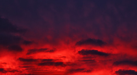 Beautiful dark dramatic view of sunset cloudy sky