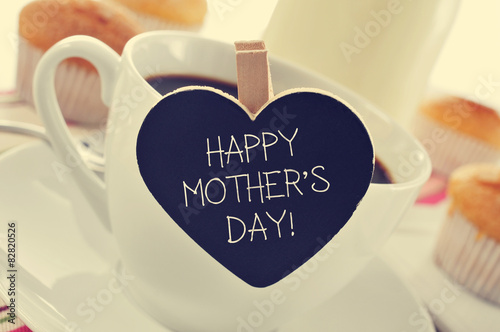 breakfast and happy mothers day written in a heart-shaped blackb