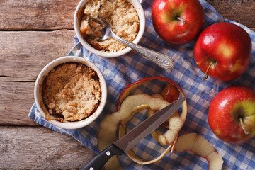 apple crumble in portion pots. Horizontal top view
