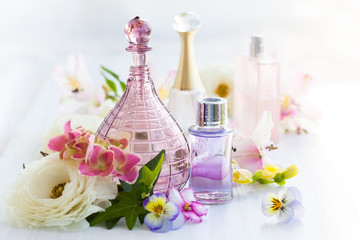 Obraz na płótnie Canvas perfume and aromatic oils bottles
