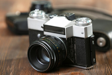 Retro camera on table close-up