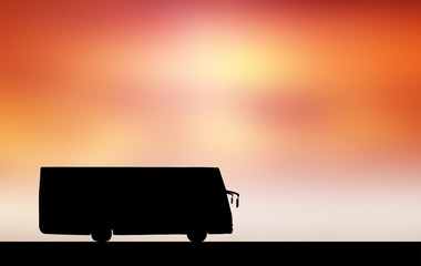 Shadow bus sunset background