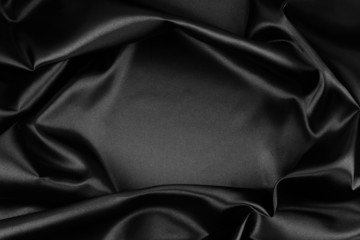 Black silk fabric texture. Copy space