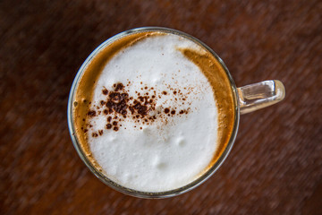 coffe latte cup on a wood table