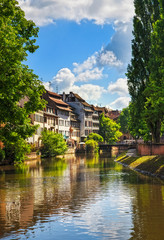 Strasbourg, water canal in Petite France area, Unesco site. Alsa - obrazy, fototapety, plakaty