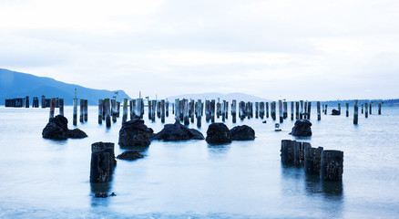 Fototapeta na wymiar abandoned pier on a calm ocean