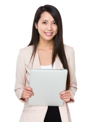Naklejka premium Asian businesswoman hold with laptop computer