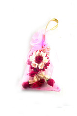 Obraz na płótnie Canvas Jasmine garland made from soap in pink bag