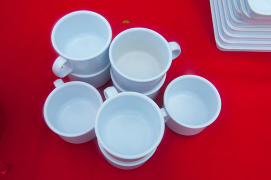 empty cup on red teable