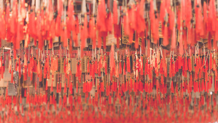Small handmade bell with wood plate and red rope