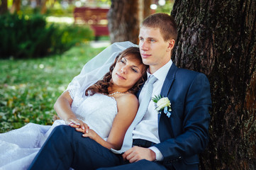 Bride and Groom at wedding Day walking Outdoors on spring nature