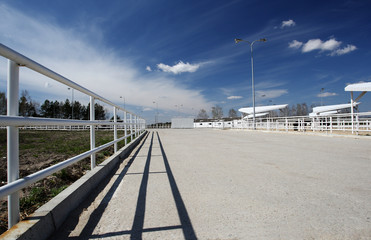 Fototapeta premium white fence against a blue sky
