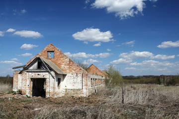 the ruins of a long brick building