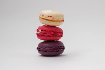 Multicolor macaroons on white background