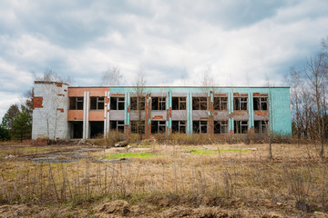 Fototapeta na wymiar Dilapidated Abandoned House In Chernobyl Resettlement Zone. Chor